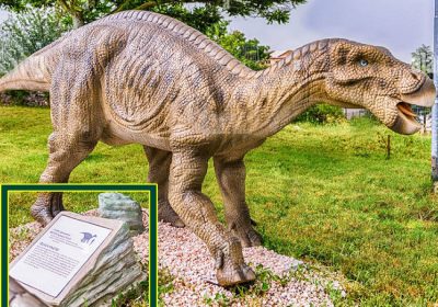 Rock Sign and Animatronic Iguanodon